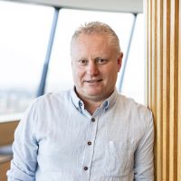 Profile photo of Lee Hickin, executive director of the National AI Centre.