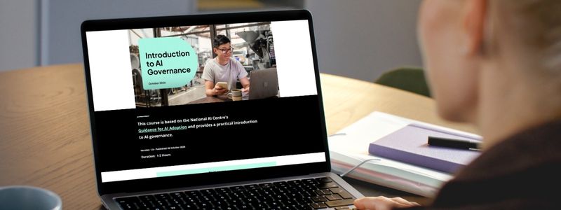 Image of the Introduction to AI Governance e-learning module presented on a laptop screen