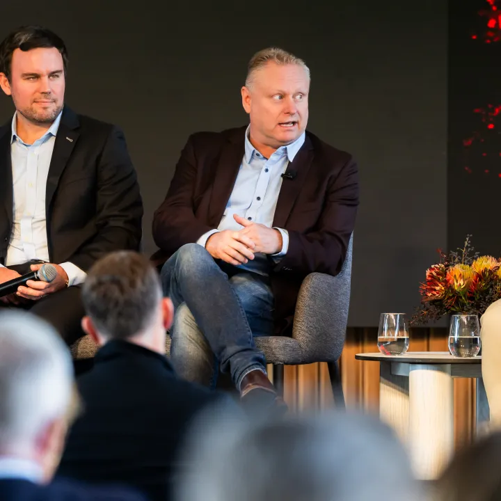 National AI Centre Executive Director Lee Hickin on stage speaking at the NAB Small Business Summit.